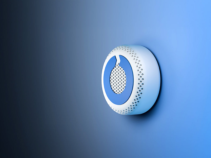 Smart Battery Sensor on valkoinen kiekko, joka näyttää palovaroittimelta.